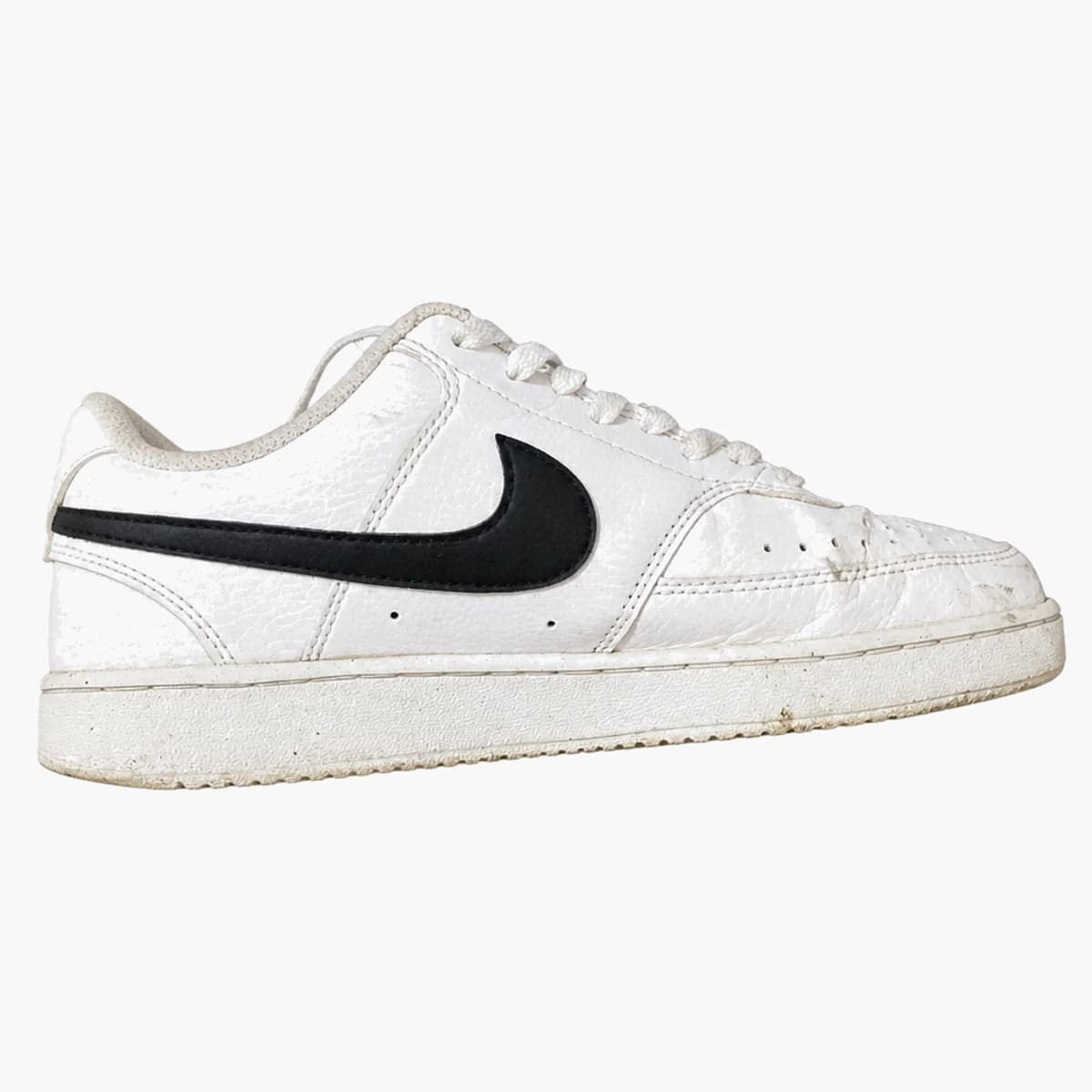 Zapatillas Nike blancas con logo negro 1
